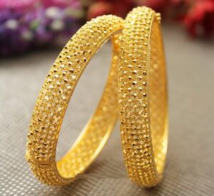 Kriti Sanon Golden Glowing Beads Bangles