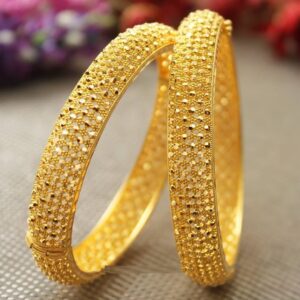 Kriti Sanon Golden Glowing Beads Bangles